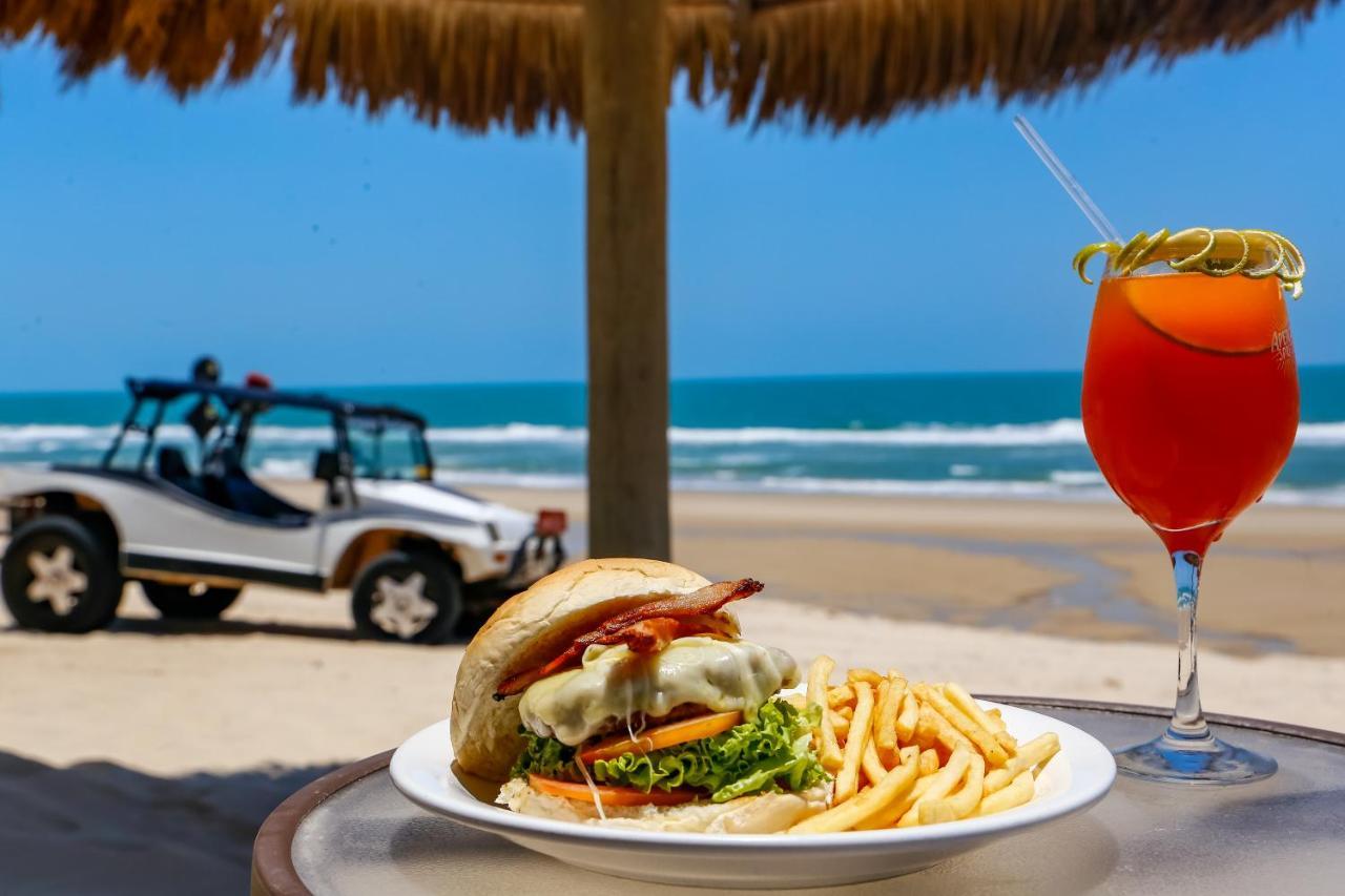 Dom Pedro Laguna Beach Resort & Golf By Wam Experience Aquiraz Exteriör bild A typical beach bar in Israel
